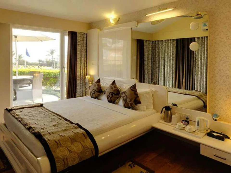 Compact guest room at Niharika Bhawan Katra